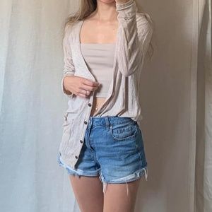 Light weight long cardigan with buttons and small pockets Size S